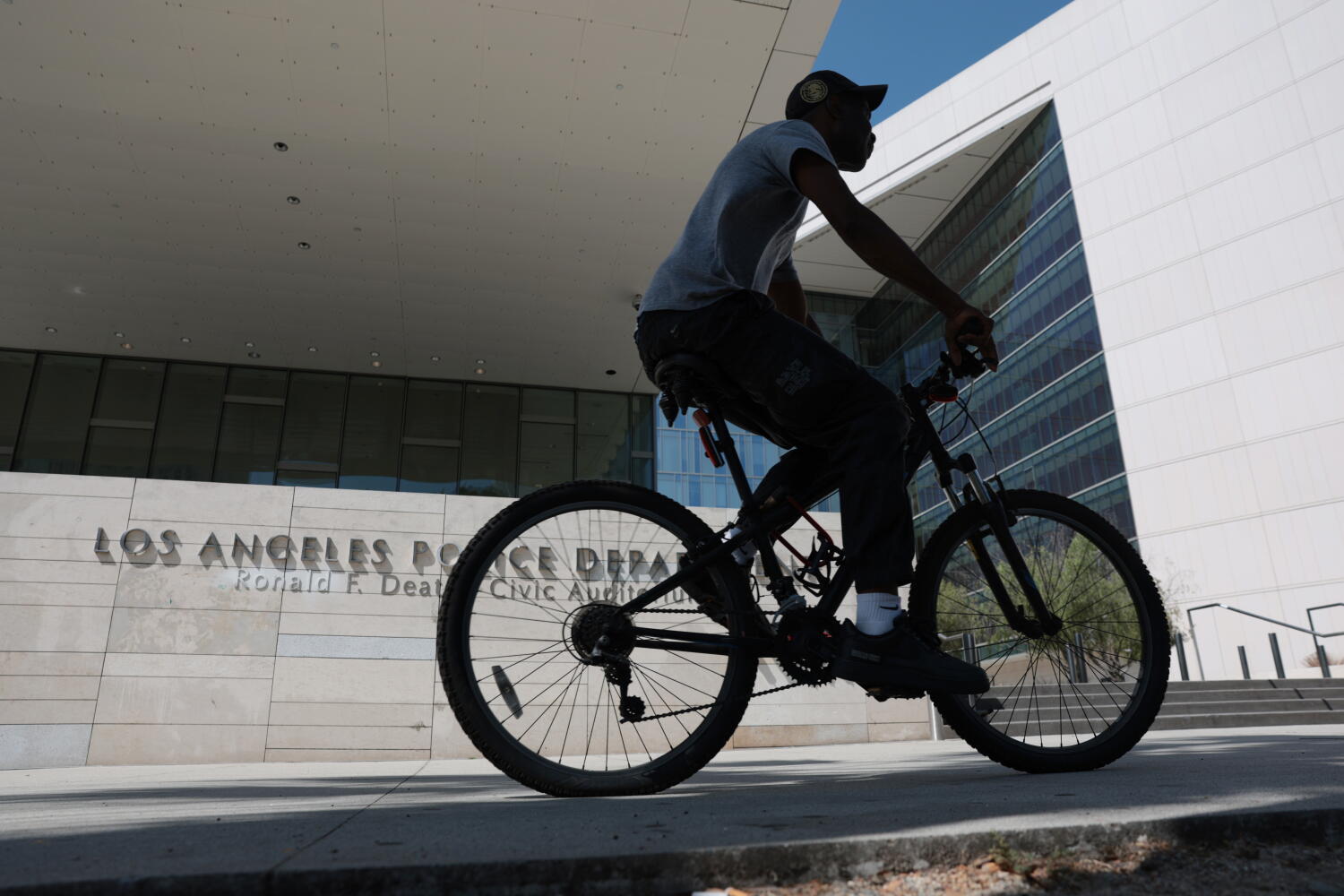 LAPD officer arrested after dragging romantic partner into street at gunpoint, sources say